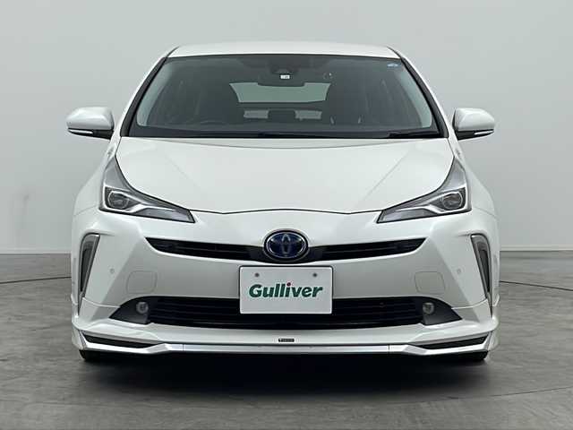 トヨタ プリウス Sツーリングセレクション 三重県 2020(令2)年 5.5万km ホワイトパールクリスタルシャイン 純正ナビ（NSZT-Y68T）/・フルセグ/CD/DVD/BT/SD/モデリスタフルエアロ/バックカメラ/前席シートヒーター/トヨタセーフティセンス/・プリクラッシュセーフティ/・オートマチックハイビーム/・レーダークルーズコントロール/・レーントレーシングアシスト/・ロードサインアシスト/前後ドライブレコーダー/ビルトインETC/LEDヘッドライト（オート）/革巻きステアリング/ステアリングスイッチ/オートライト/プッシュスタート/スマートキー