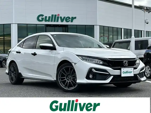 ホンダ シビック ハッチバック 島根県 2020(令2)年 6.4万km プラチナホワイトパール 登録時走行距離 63527Km/6速MT/純正SDナビ/フルセグTV/バックカメラ/シートヒーター/前席パワーシート/ハーフレザーシート/衝突軽減ブレーキ/レーンキープアシスト/禁煙車/オートマチックハイビーム/レーダークルーズコントロール/前後ドライブレコーダー/RAYS18インチAW/ETC2.0/LEDヘッドライト/スマートキー