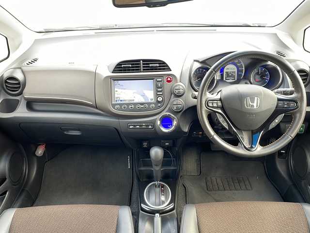 ホンダ フィット シャトル ハイブリッド ナビプレミアムセレ 島根県 2012(平24)年 5.6万km プレミアムホワイトパール 純正HDDナビゲーション/フルセグ/バックカメラ/クルーズコントロール/ハーフレザーシート/ビルトインETC/AUTOライト/電動格納ミラー/ウィンカーミラー