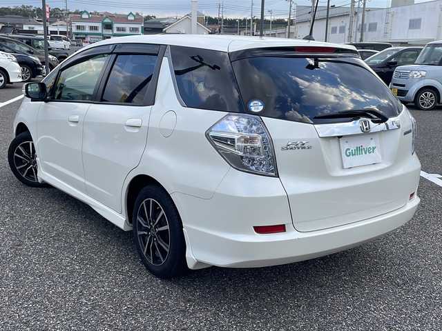 ホンダ フィット シャトル ハイブリッド ナビプレミアムセレ 島根県 2012(平24)年 5.6万km プレミアムホワイトパール 純正HDDナビゲーション/フルセグ/バックカメラ/クルーズコントロール/ハーフレザーシート/ビルトインETC/AUTOライト/電動格納ミラー/ウィンカーミラー