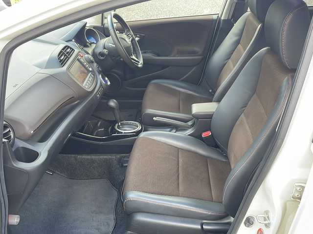 ホンダ フィット シャトル ハイブリッド ナビプレミアムセレ 島根県 2012(平24)年 5.6万km プレミアムホワイトパール 純正HDDナビゲーション/フルセグ/バックカメラ/クルーズコントロール/ハーフレザーシート/ビルトインETC/AUTOライト/電動格納ミラー/ウィンカーミラー