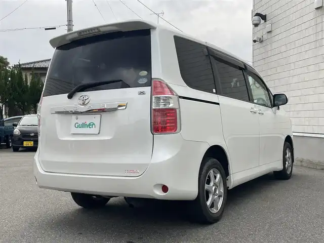 トヨタ ノア X 山形県 2009(平21)年 11.8万km ホワイトパールクリスタルシャイン 4WD/純正HDDナビ/・TV/AM/FM/CD/DVD/ハロゲンヘッドライト/フロントフォグランプ/電動格納ミラー/両側スライドドア/リモコンキー/純正フロアマット/純正ドアバイザー/ETC/冬タイヤ積み込み/保証書/取扱説明書