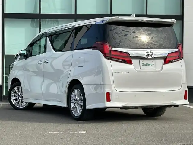 トヨタ アルファード S 和歌山県 2021(令3)年 4.4万km ホワイトパールクリスタルシャイン 純正ナビ/バックモニター/フルセグTV/DVD/純正フリップダウンモニター/両側パワースライドドア/衝突軽減ブレーキ/レーダークルーズコントロール/クリアランスソナー/純正フロアマット/純正アルミホイール/革巻きステアリング/LEDヘッドライト/フォグランプ/オートライト/オートマチックハイビーム