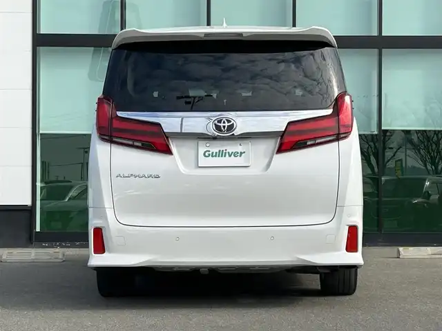 トヨタ アルファード S 和歌山県 2021(令3)年 4.4万km ホワイトパールクリスタルシャイン 純正ナビ/バックモニター/フルセグTV/DVD/純正フリップダウンモニター/両側パワースライドドア/衝突軽減ブレーキ/レーダークルーズコントロール/クリアランスソナー/純正フロアマット/純正アルミホイール/革巻きステアリング/LEDヘッドライト/フォグランプ/オートライト/オートマチックハイビーム