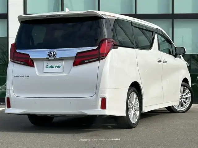 トヨタ アルファード S 和歌山県 2021(令3)年 4.4万km ホワイトパールクリスタルシャイン 純正ナビ/バックモニター/フルセグTV/DVD/純正フリップダウンモニター/両側パワースライドドア/衝突軽減ブレーキ/レーダークルーズコントロール/クリアランスソナー/純正フロアマット/純正アルミホイール/革巻きステアリング/LEDヘッドライト/フォグランプ/オートライト/オートマチックハイビーム