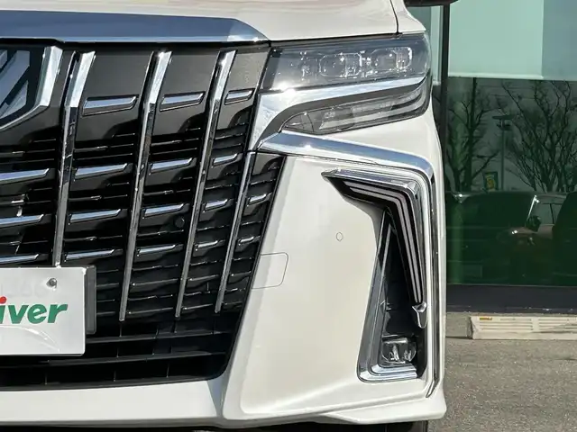 トヨタ アルファード S 和歌山県 2021(令3)年 4.4万km ホワイトパールクリスタルシャイン 純正ナビ/バックモニター/フルセグTV/DVD/純正フリップダウンモニター/両側パワースライドドア/衝突軽減ブレーキ/レーダークルーズコントロール/クリアランスソナー/純正フロアマット/純正アルミホイール/革巻きステアリング/LEDヘッドライト/フォグランプ/オートライト/オートマチックハイビーム