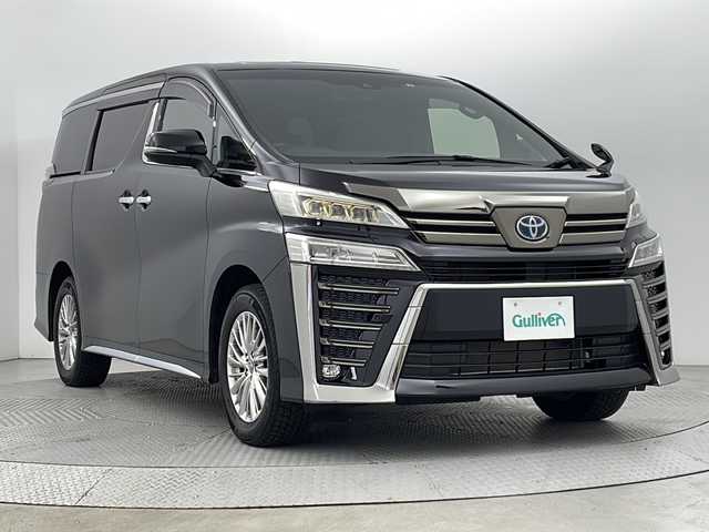 トヨタ ヴェルファイア ハイブリット ゴールデンアイズⅢ 新潟県 2022(令4)年 3.9万km ブラック ４WD/トヨタセーフティセンス/ワンオーナー/純正フリップダウンモニター/ツインサンルーフ/純正メモリナビ/　　CD/DVD/AM/FM/フルセグ/BT/ミラーキャスト/　　applecarplay/androidauto/バックモニター/両側パワースライドドア/パワーバックドア/レーダークルーズコントロール/LEDオートライト/オートマチックハイビーム」/ハーフレザーシート/オットマン/17インチ純正アルミホイール付/リアオートエアコン/AC100V/電動パーキングブレーキ/オートブレーキホールド/純正フロアマット/純正ドアバイザー/純正DVDデッキ/スペアキー/スマートキー/ETC