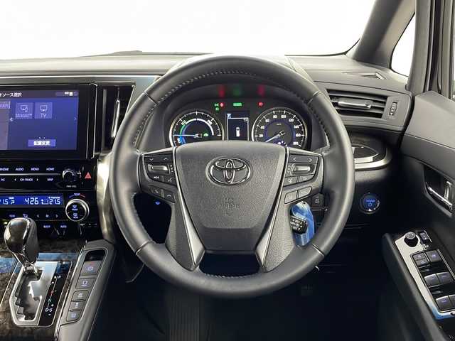 トヨタ ヴェルファイア ハイブリット ゴールデンアイズⅢ 新潟県 2022(令4)年 3.9万km ブラック ４WD/トヨタセーフティセンス/ワンオーナー/純正フリップダウンモニター/ツインサンルーフ/純正メモリナビ/　　CD/DVD/AM/FM/フルセグ/BT/ミラーキャスト/　　applecarplay/androidauto/バックモニター/両側パワースライドドア/パワーバックドア/レーダークルーズコントロール/LEDオートライト/オートマチックハイビーム」/ハーフレザーシート/オットマン/17インチ純正アルミホイール付/リアオートエアコン/AC100V/電動パーキングブレーキ/オートブレーキホールド/純正フロアマット/純正ドアバイザー/純正DVDデッキ/スペアキー/スマートキー/ETC