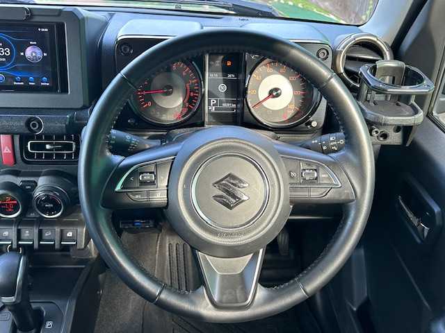 スズキ ジムニー XC 茨城県 2021(令3)年 4.9万km ジャングルグリーン ディスプレイオーディオ/Bluetooth接続/バックカメラ/ETC/クルーズコントロール/純正アルミホイール/前席シートヒーター/背面タイヤ/レーンキープアシスト/オートライト/ダウンヒルアシストコントロール/LEDヘッドライト/スマートキー