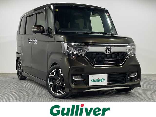 ホンダ Ｎ ＢＯＸ カスタム G L ターボ ホンダセンシング 広島県 2019(令1)年 2.8万km プレミアムグラマラスブロンズP ホンダセンシング/・衝突軽減ブレーキ/・誤発進抑制機能/・アダプティブクルーズコントロール/・オートハイビーム/・車線維持支援システム/・標識認識機能/ナビ（CN-E330D）/バックカメラ/ETC/両側パワースライドドア/ハーフレザーシート/LEDヘッドランプ/LEDフォグランプ/純正１５インチアルミホイール(165/55/R15)/エアバッグ(運転席/助手席/サイド/カーテン)