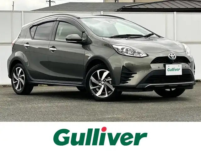 トヨタ アクア クロスオーバー グラム 岩手県 2020(令2)年 6.4万km オリーブマイカM トヨタセーフティセンス/　・プリクラッシュセーフティ/　・レーンディパーチャーアラート/　・オートマチックハイビーム/　・レーダークルーズコントロール/純正メモリナビ　/　　CD/BT/パノラミックビューモニター/バックカメラ/合皮ハーフレザーシート/シートヒーター/純正16インチアルミホイール/ルーフレール/オートエアコン/アイドリングストップ/スマートキー/ビルトインETC
