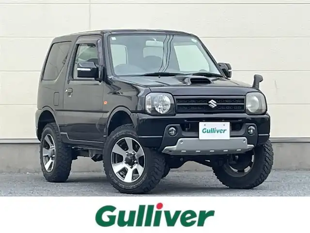 スズキ ジムニー クロスアドベンチャー XC 茨城県 2011(平23)年 5.3万km ブルーイッシュブラックパール3 Bluetooth接続/4WD/シートヒーター/USB入力端子/オートライト/純正フロアマット/純正AW/リモコンキー/エアバッグ/ABS/保証書/取扱説明書