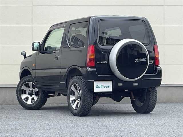 スズキ ジムニー クロスアドベンチャー XC 茨城県 2011(平23)年 5.3万km ブルーイッシュブラックパール3 Bluetooth接続/4WD/シートヒーター/USB入力端子/オートライト/純正フロアマット/純正AW/リモコンキー/エアバッグ/ABS/保証書/取扱説明書