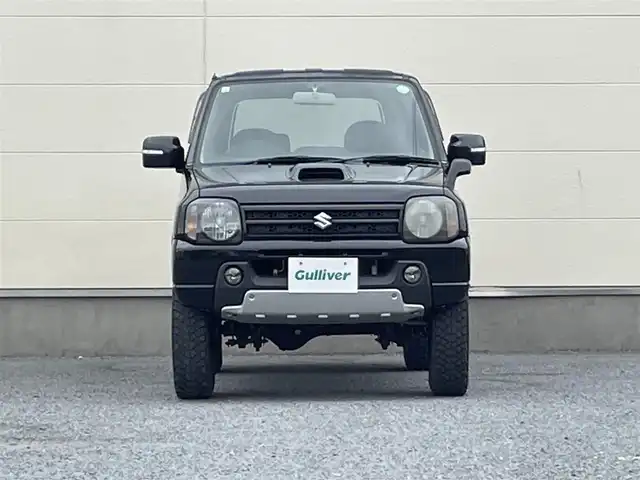 スズキ ジムニー クロスアドベンチャー XC 茨城県 2011(平23)年 5.3万km ブルーイッシュブラックパール3 Bluetooth接続/4WD/シートヒーター/USB入力端子/オートライト/純正フロアマット/純正AW/リモコンキー/エアバッグ/ABS/保証書/取扱説明書