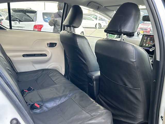 トヨタ アクア G 道東・釧路十勝 2012(平24)年 7.1万km ライムホワイトパールクリスタルシャイン ・社外液晶オーディオ/(BT.FM/AM)/・バックカメラ/・ETC/・スマートキー/・プッシュスタート/・前席シートヒーター/・社外エンジンスターター/・本革巻きステアリング/・オートエアコン/・電格ミラー/・純正フロアマット/・ドアバイザー/・LEDヘッドライト/・コーナーセンサー