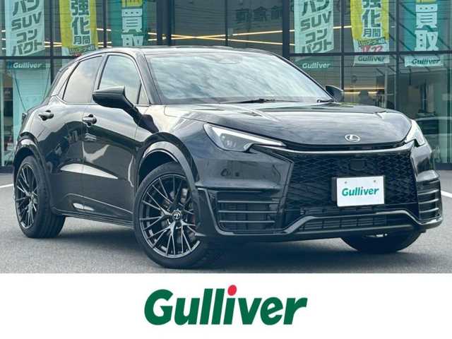 レクサス ＬＢＸ モリゾウ RR 岡山県 2025(令7)年 0.1万km グラファイトブラックガラスフレーク 登録時走行距離　959km/禁煙車/6速MT/4WD/マークレビンソンプレミアムサウンドシステム/レクサスLBXサウンドシステム/9.8インチディスプレイオーディオ(コネクティッドナビ対応)/　【フルセグTV/Bluetooth/Miracast】　/パノラミックビューモニター（全方位カメラ）/ブラック本革シート/メモリ機能付パワーシート/純正レッドキャリパー　　/Lexus Safety System＋/PCS/LDA/LTA/AHS/RSA/TMN/PDA/レーダークルコン/ＢＳＭ/安心降車アシスト/パーキングサポートレーキ（PKSB）/RCTA＆クリアランスソナー/カラーヘッドアップディスプレイ　/ビルトインETC2.0/ＬＥＤヘッドライト　/オートマチックハイビーム/シートヒーター　/ステアリングヒーター/置くだけ充電/保証書