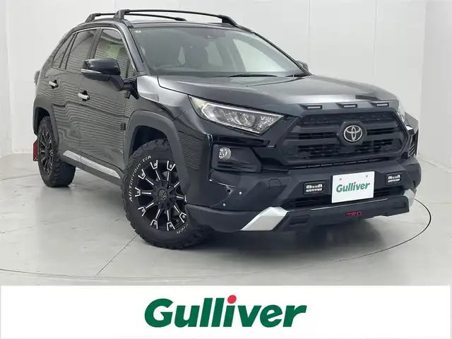 トヨタ ＲＡＶ４ アドベンチャー 茨城県 2019(令1)年 6.5万km アティチュードブラックマイカ 純正9型ナビ/バックカメラ/フルセグ/TRDフロントバンパーガーニッシュ/TRDバックドアロアガーニッシュ/TRDマッドフラップ/衝突被害軽減ブレーキ/車線逸脱抑制装置/レーダークルーズコントロール/オートマチックハイビーム/クリアランスソナー/BSM/ETC/ドラレコ/シートヒーター/ベンチレーション/社外17インチAW/LEDヘッドライト/スマートキー