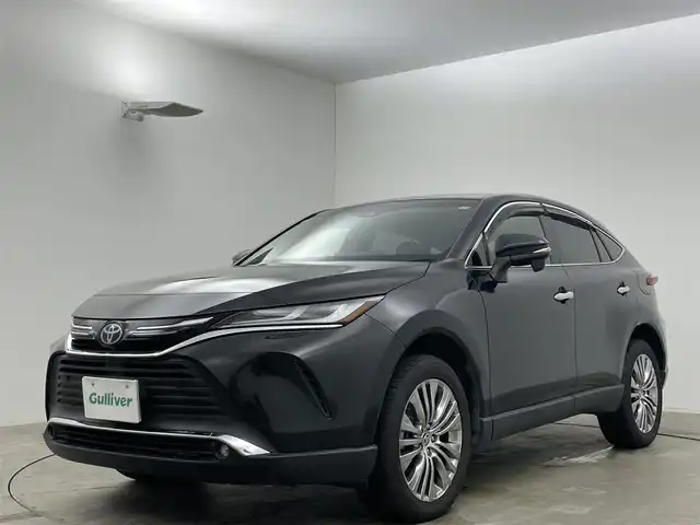 トヨタ ハリアー ハイブリッド Z 岡山県 2020(令2)年 5.3万km プレシャスブラックパール JBLサウンド/Toyota Safety Sense	/・プリクラッシュセーフティ		/・レーントレーシングアシスト		/・レーダークルーズコントロール		/・ブラインドスポットモニター/・オートマチックハイビーム	/・クリアランスソナー	/ヘッドアップディスプレイ/純正12.3型DAナビ/（USB/BT/フルセグ/Miracast/HDMI/AUX/iPod)/フルセグTV/デジタルインナーミラー（ドラレコ付）/バックカメラ/AC1500W充電/パワーバックドア/ハーフレザー/運転席パワーシート/ビルトインETC2.0/プッシュスタート/スマートキー/LEDヘッドライト/LEDフォグランプ/純正19inAW/純正フロアマット/ドアバイザー