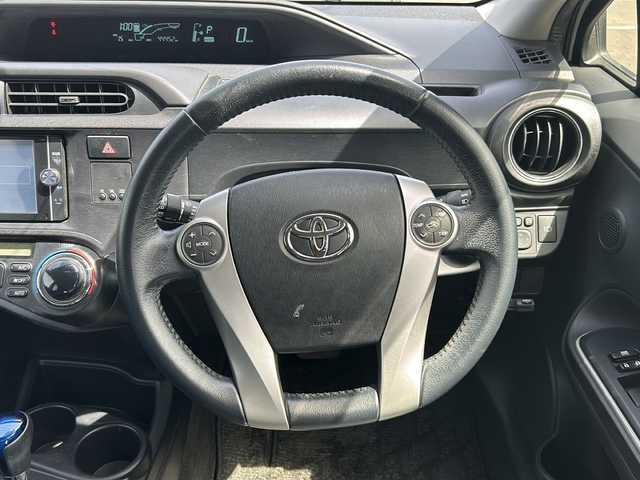 トヨタ アクア G ブラックソフトレザーセレ 神奈川県 2014(平26)年 4.5万km ライムホワイトパールクリスタルシャイン 【(株)IDOMが運営する【じしゃロン相模原店】の自社ローン対象車両になります。こちらは現金ご利用時の価格です。自社ローンご希望の方は別途その旨お申付け下さい。】/純正メモリナビ/バックカメラ/ブラックレザーシート/ETC/ヘッドライトウォッシャー/スマートキー×2/プッシュスタート/純正アルミホイール