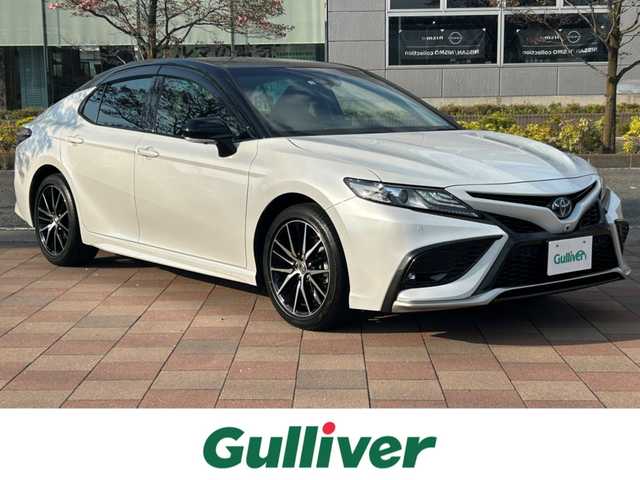 トヨタ カムリ WSレザーパッケージ 福島県 2022(令4)年 0.5万km アティチュードブラックマイカ/プラチナホワイトパールマイカ 純正８インチナビ/(BT/DVD/CD/AM/FM)/パノラミックビューモニター/レーダークルーズコントロール/ブラインドスポットモニター/衝突軽減ブレーキ/レーンキープアシスト/レザーシート/前席シートヒーター/LEDヘッドライト/ドライブレコーダー/プッシュスタート/コーナーセンサー