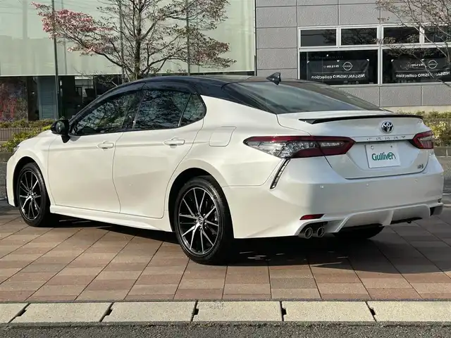 トヨタ カムリ WSレザーパッケージ 福島県 2022(令4)年 0.5万km アティチュードブラックマイカ/プラチナホワイトパールマイカ 純正８インチナビ/(BT/DVD/CD/AM/FM)/パノラミックビューモニター/レーダークルーズコントロール/ブラインドスポットモニター/衝突軽減ブレーキ/レーンキープアシスト/レザーシート/前席シートヒーター/LEDヘッドライト/ドライブレコーダー/プッシュスタート/コーナーセンサー