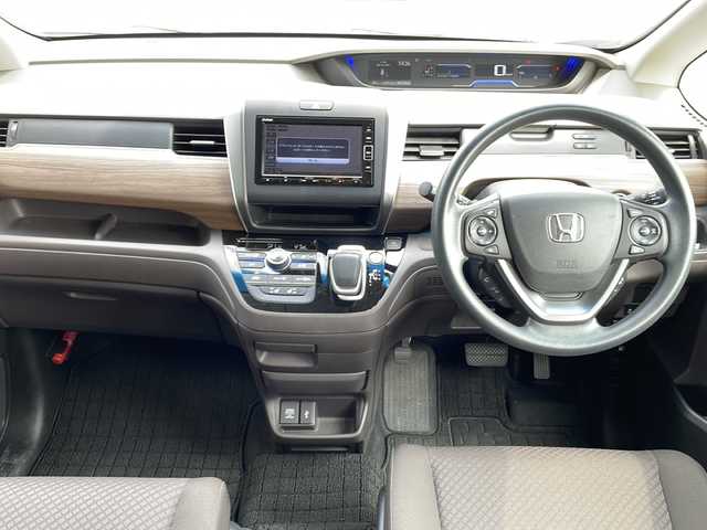 ホンダ フリード ハイブリット 鹿児島県 2020(令2)年 8.2万km プラチナホワイトパール 社外ナビ/Bluetooth/SD/CD/DVD/パワーウィンドウ/両側パワースライドドア/プッシュスタートボタン/シートヒーター/クルーズコントロール/フルセグ/レーンアシスト/オートライト/三列シート/電動格納ミラー/ETC