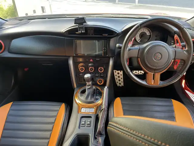 トヨタ ８６ GT リミテッド 兵庫県 2012(平24)年 12.9万km オレンジメタリック (株)IDOMが運営する【じしゃロン西宮店】の自社ローン専用車両になります。こちらは現金またはオートローンご利用時の価格です。自社ローンご希望の方は別途その旨お申付け下さい/＊ETC/＊バックカメラ/＊TRDタワーバー/＊GANADORマフラー/＊ADVAN　Racing18AW/＊フルセグ/＊シートヒーター/＊86専用シートカバー