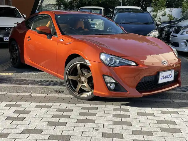 トヨタ ８６ GT リミテッド 兵庫県 2012(平24)年 12.9万km オレンジメタリック (株)IDOMが運営する【じしゃロン西宮店】の自社ローン専用車両になります。こちらは現金またはオートローンご利用時の価格です。自社ローンご希望の方は別途その旨お申付け下さい/＊ETC/＊バックカメラ/＊TRDタワーバー/＊GANADORマフラー/＊ADVAN　Racing18AW/＊フルセグ/＊シートヒーター/＊86専用シートカバー