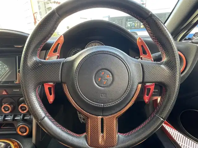 トヨタ ８６ GT リミテッド 兵庫県 2012(平24)年 12.9万km オレンジメタリック (株)IDOMが運営する【じしゃロン西宮店】の自社ローン専用車両になります。こちらは現金またはオートローンご利用時の価格です。自社ローンご希望の方は別途その旨お申付け下さい/＊ETC/＊バックカメラ/＊TRDタワーバー/＊GANADORマフラー/＊ADVAN　Racing18AW/＊フルセグ/＊シートヒーター/＊86専用シートカバー