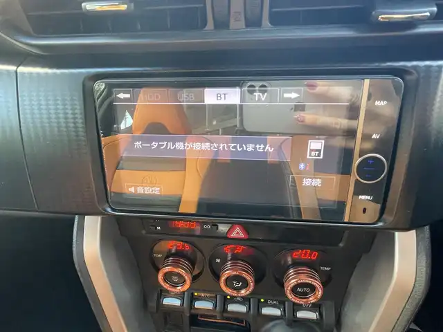 トヨタ ８６ GT リミテッド 兵庫県 2012(平24)年 12.9万km オレンジメタリック (株)IDOMが運営する【じしゃロン西宮店】の自社ローン専用車両になります。こちらは現金またはオートローンご利用時の価格です。自社ローンご希望の方は別途その旨お申付け下さい/＊ETC/＊バックカメラ/＊TRDタワーバー/＊GANADORマフラー/＊ADVAN　Racing18AW/＊フルセグ/＊シートヒーター/＊86専用シートカバー