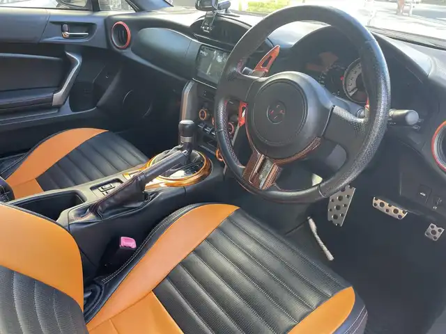 トヨタ ８６ GT リミテッド 兵庫県 2012(平24)年 12.9万km オレンジメタリック (株)IDOMが運営する【じしゃロン西宮店】の自社ローン専用車両になります。こちらは現金またはオートローンご利用時の価格です。自社ローンご希望の方は別途その旨お申付け下さい/＊ETC/＊バックカメラ/＊TRDタワーバー/＊GANADORマフラー/＊ADVAN　Racing18AW/＊フルセグ/＊シートヒーター/＊86専用シートカバー