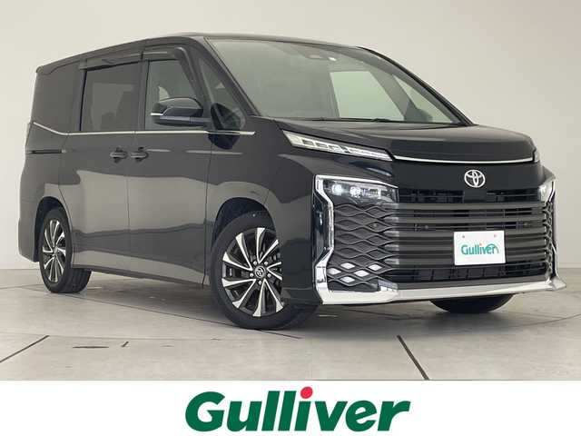 トヨタ ヴォクシー S－Z 愛知県 2023(令5)年 2.6万km アティチュードブラックマイカ 純正10.5型ディスプレイオーディオナビ/フリップダウンモニター/両側パワースライドドア/レーダークルーズコントロール/シートヒーター/バックカメラ/コーナーセンサー/純正アルミホイール/ETC2.0/LEDヘッドライト/リアオートエアコン/レーンキープアシスト/オートマチックハイビーム/衝突軽減システム/フルセグ/CD DVD/Bluetooth/ステアリングスイッチ/スマートキー/プッシュスタート