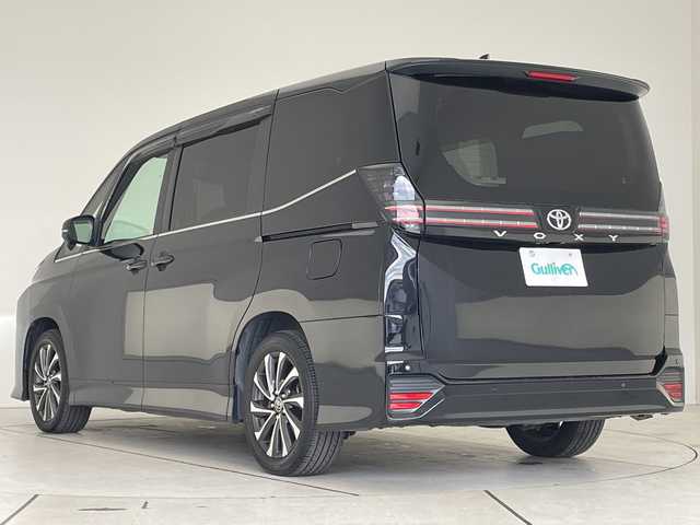 トヨタ ヴォクシー S－Z 愛知県 2023(令5)年 2.6万km アティチュードブラックマイカ 純正10.5型ディスプレイオーディオナビ/フリップダウンモニター/両側パワースライドドア/レーダークルーズコントロール/シートヒーター/バックカメラ/コーナーセンサー/純正アルミホイール/ETC2.0/LEDヘッドライト/リアオートエアコン/レーンキープアシスト/オートマチックハイビーム/衝突軽減システム/フルセグ/CD DVD/Bluetooth/ステアリングスイッチ/スマートキー/プッシュスタート