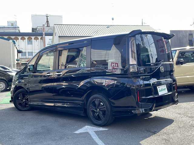 ホンダ ステップワゴン スパーダ ハイブリッドG EX HセンシングBスタイ 京都府 2019(令1)年 8.2万km プレミアムスパークルブラックパール 無限エアロ /10型ナビ/　VXU-197SWi/ バックカメラ /BT /両側パワースライドドア /シートヒーター /ETC /ホンダセンシング /ACC /オートホールド /スマートキー２個 /LEDライト /オートライト/登録時走行距離：81359km/メーカー純正10型ナビ/　CD DVD BT フルセグTV/両側パワースライドドア/衝突被害軽減装置/レーンキープアシスト/レーダークルーズコントロール/LEDオートヘッドライト/フォグランプ/ハーフレザーシート/シートヒーター/ビルトインETC/オートホールド機能付き電子パーキングブレーキ/ロールサンシェード/プッシュスタート/スマートキー/スペアキー