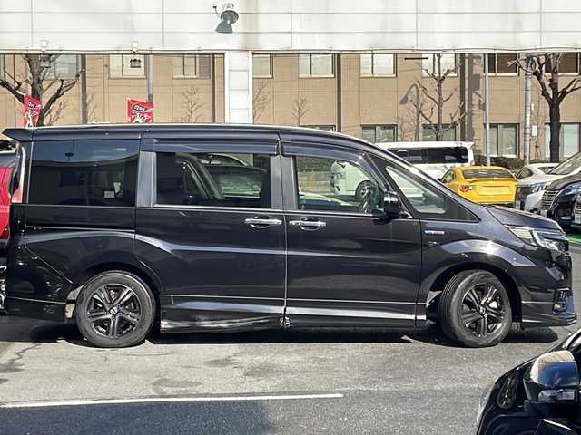 ホンダ ステップワゴン スパーダ ハイブリッドG EX HセンシングBスタイ 京都府 2019(令1)年 8.2万km プレミアムスパークルブラックパール 無限エアロ /10型ナビ/　VXU-197SWi/ バックカメラ /BT /両側パワースライドドア /シートヒーター /ETC /ホンダセンシング /ACC /オートホールド /スマートキー２個 /LEDライト /オートライト/登録時走行距離：81359km/メーカー純正10型ナビ/　CD DVD BT フルセグTV/両側パワースライドドア/衝突被害軽減装置/レーンキープアシスト/レーダークルーズコントロール/LEDオートヘッドライト/フォグランプ/ハーフレザーシート/シートヒーター/ビルトインETC/オートホールド機能付き電子パーキングブレーキ/ロールサンシェード/プッシュスタート/スマートキー/スペアキー