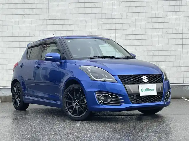 スズキ スイフト スポーツ 富山県 2015(平27)年 4.5万km ブーストブルーパールメタリック ６速マニュアル/社外ナビ/フルセグＴＶ／Ｂｌｕｅｔｏｏｔｈ/クルーズコントロール/社外ＡＷ１７インチ/社外ＬＥＤヘッドライト/スマートキー/プッシュスタート/純正フロアマット/ドアバイザー/Wエアバック/ABS/保証書／取説有り
