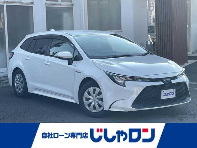 トヨタ カローラツーリング ハイブリッド G－X 埼玉県 2020(令2)年 14.7万km スーパーホワイトⅡ (株)IDOMが運営する【じしゃロン川越店】の自社ローン専用車両になります。/こちらは現金またはオートローンご利用時の価格です。/自社ローンご希望の方は別途その旨お申付け下さい/トヨタセーフティセンス　/純正ディスプレイオーディオ/（AM/FM/BT)/車線逸脱防止装置　/オートハイビーム　/ウインカミラー　/純正フロアマット　/ＥＴＣ　/クルーズコントロール　/前方アラート　/スマートキー　/ＬＥＤヘッドライト
