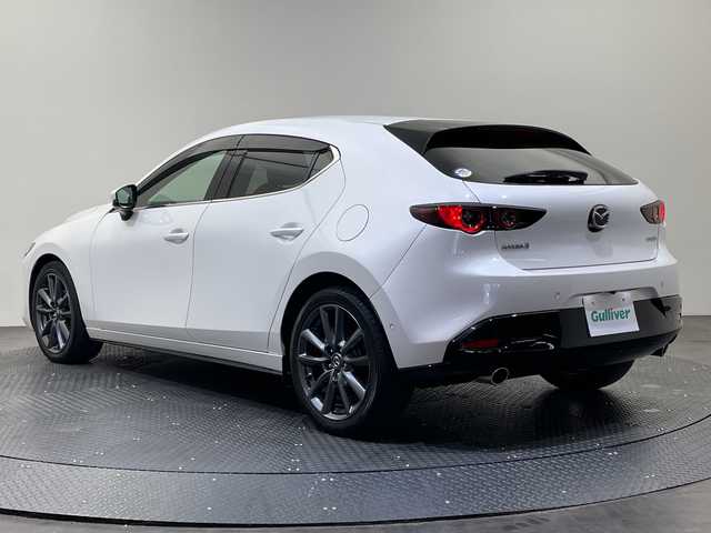 マツダ マツダ３ファストバック 15S ツーリング 愛媛県 2020(令2)年 3.4万km スノーフレイクホワイトパールマイカ 純正ナビ/Bluetooth/フルセグ/USB/全周囲カメラ/レーダークルーズコントロール/衝突被害軽減ブレーキ/レーンキープアシスト/前後コーナーセンサー/ブラインドスポットモニター/LEDヘッドライト/オートマチックハイビーム/オートライト/ETC/プッシュスタート/スペアキー/取扱説明書