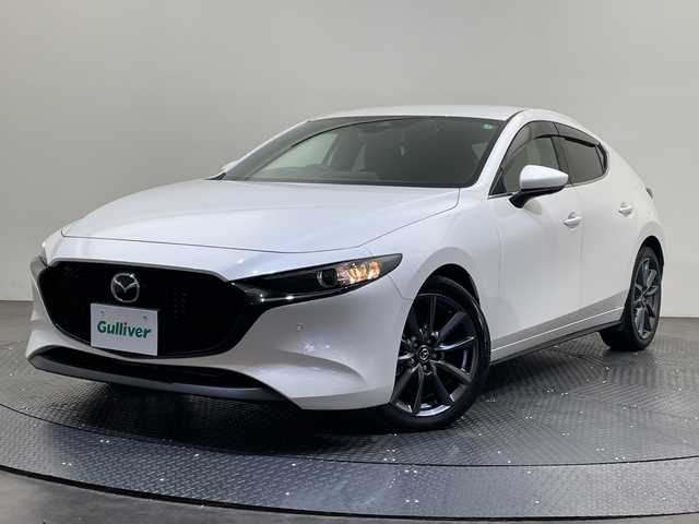 マツダ マツダ３ファストバック 15S ツーリング 愛媛県 2020(令2)年 3.4万km スノーフレイクホワイトパールマイカ 純正ナビ/Bluetooth/フルセグ/USB/全周囲カメラ/レーダークルーズコントロール/衝突被害軽減ブレーキ/レーンキープアシスト/前後コーナーセンサー/ブラインドスポットモニター/LEDヘッドライト/オートマチックハイビーム/オートライト/ETC/プッシュスタート/スペアキー/取扱説明書