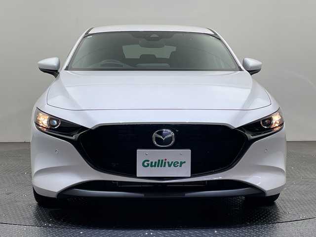 マツダ マツダ３ファストバック 15S ツーリング 愛媛県 2020(令2)年 3.4万km スノーフレイクホワイトパールマイカ 純正ナビ/Bluetooth/フルセグ/USB/全周囲カメラ/レーダークルーズコントロール/衝突被害軽減ブレーキ/レーンキープアシスト/前後コーナーセンサー/ブラインドスポットモニター/LEDヘッドライト/オートマチックハイビーム/オートライト/ETC/プッシュスタート/スペアキー/取扱説明書