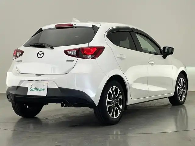 マツダ デミオ XD ツーリング 愛知県 2016(平28)年 8.7万km スノーフレイクホワイトパールマイカ 純正ナビ　シートヒーター　禁煙車　ＨＵＤ　フルセグＴＶ　ＤＶＤ　パドルシフト　USB接続　ドラレコ　ＥＴＣ　衝突軽減　ＬＥＤオートライト　フォグランプ　Bluetooth　クルコン　純正フロアマット　純正１６インチアルミ　プッシュスタート　スマートキー