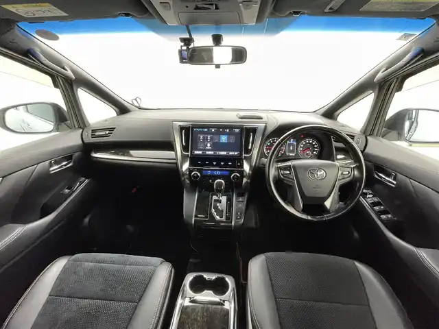 トヨタ アルファード S Aパッケージ タイプブラック 熊本県 2016(平28)年 7万km ホワイトパールクリスタルシャイン ツインムーンルーフ　/純正ナビ（ＣＤ・ＤＶＤ・フルセグ・ＢＴ・ＳＤ）/バックカメラ　/純正フリップダウンモニター　/社外前後ドライブレコーダー　/ビルトインＥＴＣ　/両側パワースライドドア　/前後クリアランスソナー/クルーズコントロール/衝突軽減ブレーキ/横滑り防止/パワーバックドア/ハーフレザーシート/純正フロアマット/純正16インチAW/オートライト/LEDヘッドライト/フォグライト/スマートキー/プッシュスタート/スペアキー1本