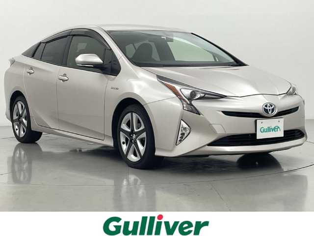 トヨタ プリウス S ツーリングセレクション 熊本県 2016(平28)年 5.6万km スティールブロンドM 純正９インチナビDSZT-YC4T（ＣＤ・ＤＶＤ・フルセグ・ＢＴ・ＳＤ）/バックカメラ　/社外前方ドライブレコーダー　/ビルトインＥＴＣ　/前席シートヒーター　/横滑り防止/アイドリングストップ/電動格納ミラー/パワーウインドウ/パワーステアリング　/純正フロアマット　/純正１７インチＡＷ　/オートライト/LEDヘッドライト/フォグライト/スマートキー/プッシュスタート/スペアキー1本