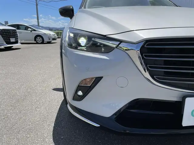 マツダ ＣＸ－３ 15S スーパー エッジー 佐賀県 2023(令5)年 1.3万km パールⅡ ワンオーナー/マツダコネクト純正ナビゲーション/・BT CD DVD AM FM フルセグTV/・Apple Car Play/Android Auto/360°ビューモニター/ビルトインETC/前後ドライブレコーダー/ブラックルーフ/ブラック/ホワイト合皮シート/・D席メモリ付パワーシート/・DN席シートヒーター/革巻きステアリング/・ステアリングヒーター/・ステアリングリモコン/・パドルシフト/ヘッドアップディスプレイ/アダプティブLEDヘッドランプ/・ハイビームコントロールシステム/スマートキー/純正18インチアルミホイール/純正フロアマット/新車保証書/取扱説明書/スペアキー1本あり/アドバンスドスマートシティブレーキサポート/後退時スマートシティブレーキサポート/AT誤発進抑制制御/全車速追従機能付レーダークルーズコントロール/ブラインドスポットモニタリング/パーキングセンサー/車線逸脱警報システム/ドライバーアテンションアラート