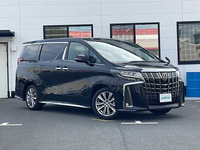 トヨタ アルファード S タイプゴールドⅡ 山口県 2021(令3)年 3.3万km ブラック 純正フリップダウンモニター/純正ディスプレイオーディオ/・ナビ機能/・CD/DVDキット/・フルセグテレビ/・Bluetooth接続/バックカメラ/両側パワースライドドア/ビルトインETC/ドライブレコーダー/Toyota Safety Sense/・プリクラッシュセーフティ/・レーントレーシングアシスト/・ロードサインアシスト/・レーダークルーズコントロール/・先行車発進告知機能/・クリアランスソナー/パワーバックドア/純正フロアマット/ハーフレザーシート/純正18インチアルミホイール/純正LEDライト/オートマチックハイビーム