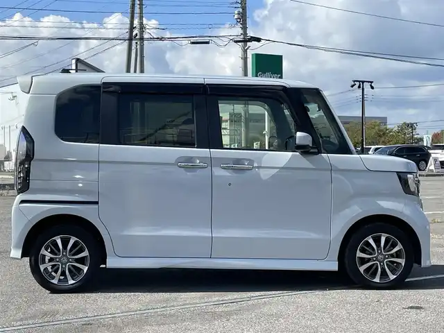 ホンダ Ｎ ＢＯＸ カスタム L 道央・札幌 2022(令4)年 2.5万km プレミアムサンライトホワイトパール ４WD/ワンオーナー/純正ディーラーOPナビ/CD/DVD/BT/フルセグ/ホンダセンシング/衝突被害軽減ブレーキ/横滑り防止装置/アダプティブクルーズコントロール/レーンキープアシスト/リアパーキングセンサー/バックカメラ/ビルトインETC/ドライブレコーダー/ECONモード/両側パワースライドドア/前席シートヒーター/ステアリングリモコン/電動パーキング/ブレーキホールド/プッシュスタート/リモートスタート/LEDヘッドライト/オートライト/オートハイビーム/フォグランプ/電動格納ミラー/ヘッドライトレベライザー/ヒーテッドドアミラー/ウィンカーミラー/純正フロアマット/ドアバイザー