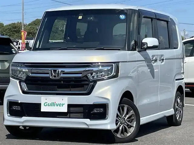 ホンダ Ｎ ＢＯＸ カスタム L 道央・札幌 2022(令4)年 2.5万km プレミアムサンライトホワイトパール ４WD/ワンオーナー/純正ディーラーOPナビ/CD/DVD/BT/フルセグ/ホンダセンシング/衝突被害軽減ブレーキ/横滑り防止装置/アダプティブクルーズコントロール/レーンキープアシスト/リアパーキングセンサー/バックカメラ/ビルトインETC/ドライブレコーダー/ECONモード/両側パワースライドドア/前席シートヒーター/ステアリングリモコン/電動パーキング/ブレーキホールド/プッシュスタート/リモートスタート/LEDヘッドライト/オートライト/オートハイビーム/フォグランプ/電動格納ミラー/ヘッドライトレベライザー/ヒーテッドドアミラー/ウィンカーミラー/純正フロアマット/ドアバイザー