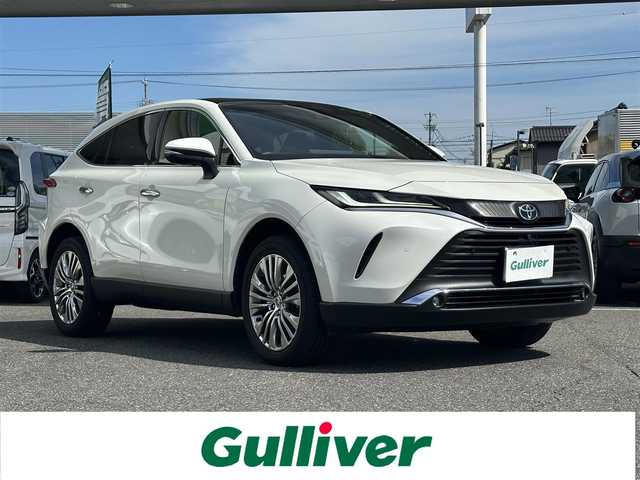 トヨタ ハリアー Z レザーパッケージ 島根県 2021(令3)年 4.5万km ホワイトパールクリスタルシャイン 登録時走行距離44494km/取扱説明書/保証書/純正12.3インチナビ/(BT/フルセグTV/AM/FM/ミラーキャスト)/全方位カメラ/JBLサウンド/置くだけ充電/シートメモリー/オートブレーキホールド/調光パノラマルーフ/ブラインドスポットモニター/デジタルインナーミラー/衝突被害軽減システム/車線逸脱警報/横滑り防止装置/レーダークルーズコントロール/レザーシート/ビルトインETC2.0/アイドリングストップ/LEDヘッドライト/フォグランプ/オートライト/ウィンカーミラー/電動格納ミラー/純正19インチAW/シートヒーター/ベンチレーションシート/ステアリングヒーター/プッシュスタート/スペアキー