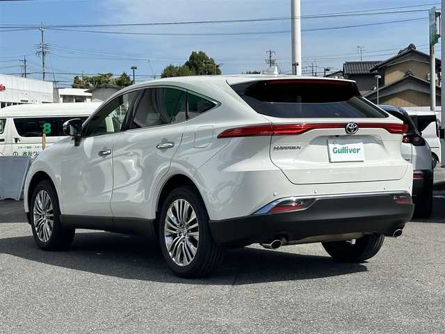 トヨタ ハリアー Z レザーパッケージ 島根県 2021(令3)年 4.5万km ホワイトパールクリスタルシャイン 登録時走行距離44494km/取扱説明書/保証書/純正12.3インチナビ/(BT/フルセグTV/AM/FM/ミラーキャスト)/全方位カメラ/JBLサウンド/置くだけ充電/シートメモリー/オートブレーキホールド/調光パノラマルーフ/ブラインドスポットモニター/デジタルインナーミラー/衝突被害軽減システム/車線逸脱警報/横滑り防止装置/レーダークルーズコントロール/レザーシート/ビルトインETC2.0/アイドリングストップ/LEDヘッドライト/フォグランプ/オートライト/ウィンカーミラー/電動格納ミラー/純正19インチAW/シートヒーター/ベンチレーションシート/ステアリングヒーター/プッシュスタート/スペアキー