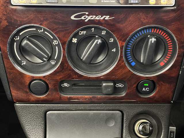 ダイハツ コペン タンレザーエディション 埼玉県 2006(平18)年 9.5万km ダークグリーンマイカ 社外ナビ/（TV/BT/FM/AM/USB/CD/DVD)/前席シートヒーター/前後ドライブレコーダー/純正フロアマット/純正アルミホイール/ETC